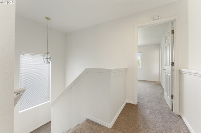 15629 NW Energia St, Portland, OR 97229 - hall featuring carpet floors and an upstairs landing
