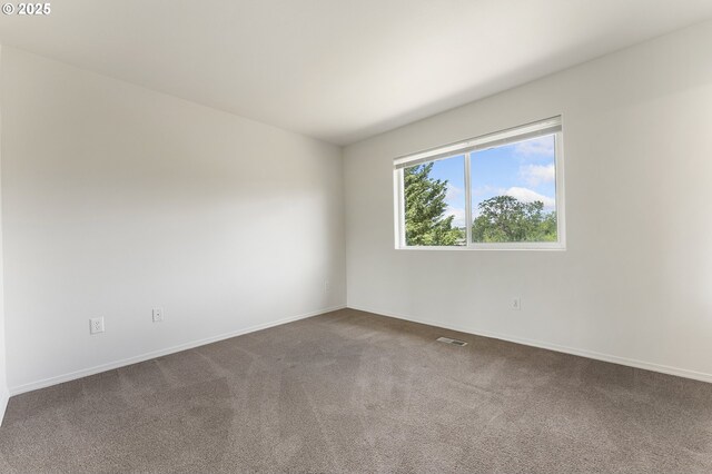 15629 NW Energia St, Portland, OR 97229 - carpeted spare room featuring baseboards