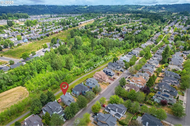 15629 NW Energia St, Portland, OR 97229 - aerial view of property's location with nearby suburban area and a forest
