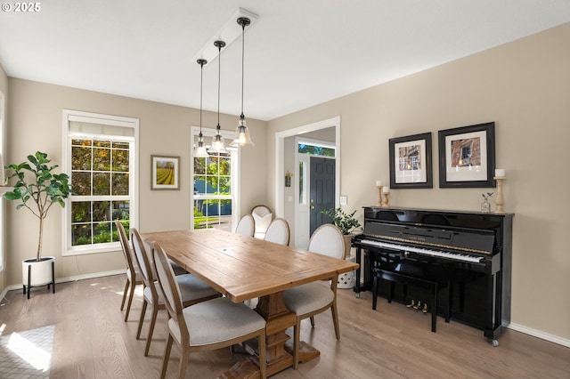 1648 NW 127th Ter, Portland, OR 97229 - dining room with light wood-type flooring and baseboards
