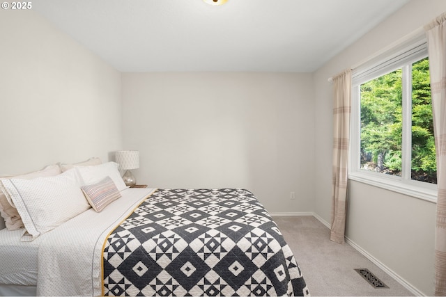 1648 NW 127th Ter, Portland, OR 97229 - bedroom with light carpet and baseboards