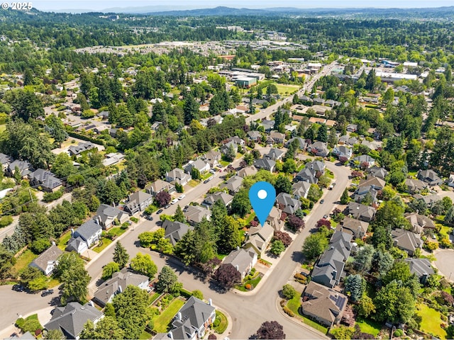 1648 NW 127th Ter, Portland, OR 97229 - aerial perspective of suburban area featuring a heavily wooded area