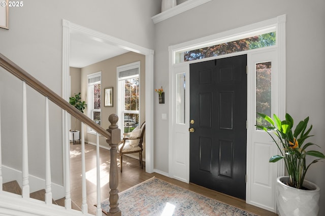 1648 NW 127th Ter, Portland, OR 97229 - foyer entrance featuring stairs and wood finished floors