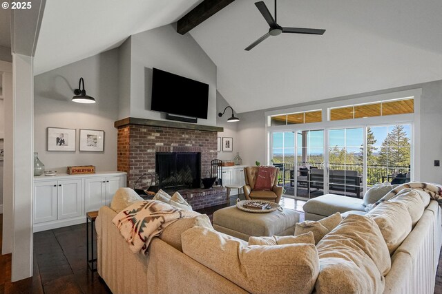 4040 Victor Point Rd NE, Silverton, OR 97381 - living area featuring beam ceiling, a ceiling fan, high vaulted ceiling, a brick fireplace, and dark wood finished floors