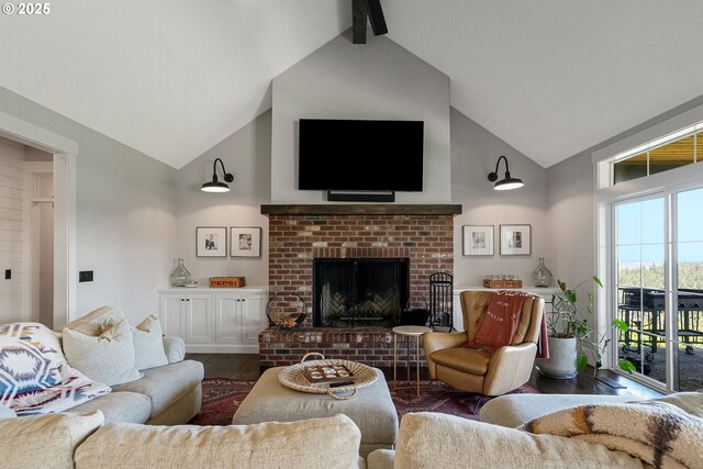 4040 Victor Point Rd NE, Silverton, OR 97381 - living room featuring high vaulted ceiling, a fireplace, and beamed ceiling