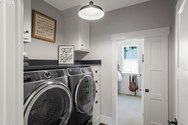 4040 Victor Point Rd NE, Silverton, OR 97381 - laundry room featuring separate washer and dryer and cabinet space