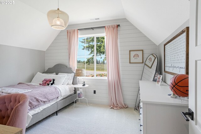 4040 Victor Point Rd NE, Silverton, OR 97381 - bedroom featuring lofted ceiling, wooden walls, and light carpet