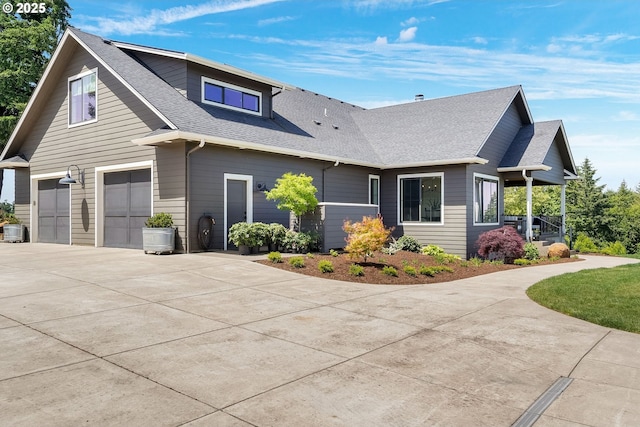 4040 Victor Point Rd NE, Silverton, OR 97381 - view of front facade featuring driveway, an attached garage, and a shingled roof