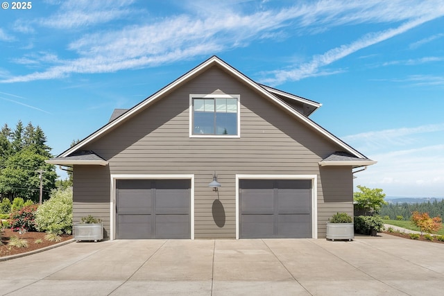 4040 Victor Point Rd NE, Silverton, OR 97381 - view of side of home featuring driveway and a garage