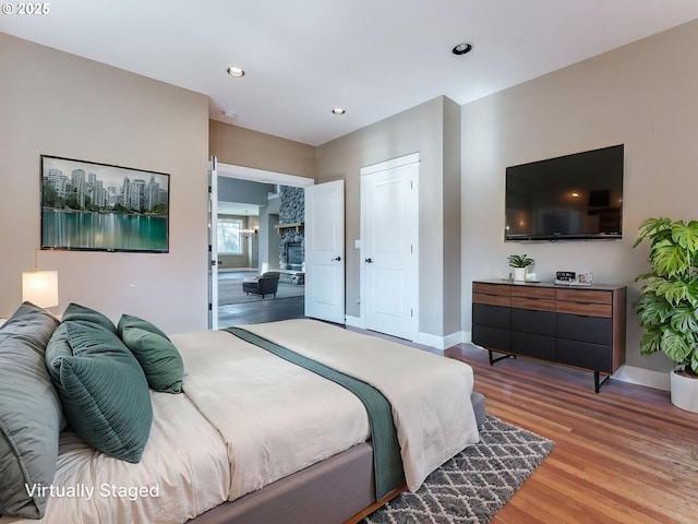 10193 SE Crescent Ridge Loop, Happy Valley, OR 97086 - bedroom with light wood finished floors and recessed lighting