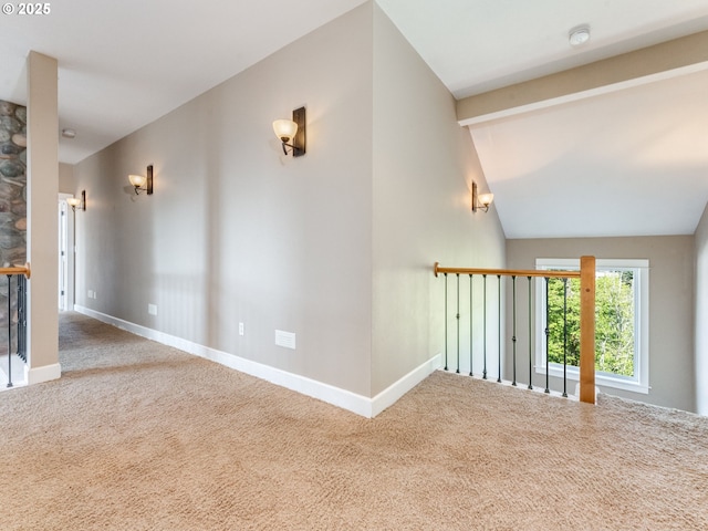 10193 SE Crescent Ridge Loop, Happy Valley, OR 97086 - spare room with carpet floors, vaulted ceiling, and a smoke detector