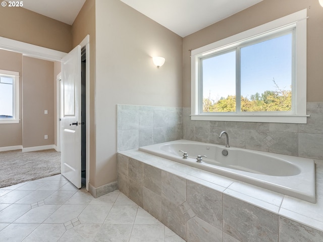 10193 SE Crescent Ridge Loop, Happy Valley, OR 97086 - bathroom with a garden tub and tile patterned floors