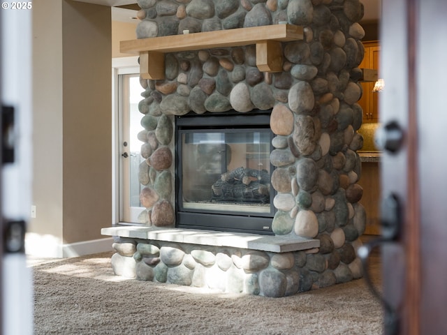 10193 SE Crescent Ridge Loop, Happy Valley, OR 97086 - detailed view of baseboards and a fireplace