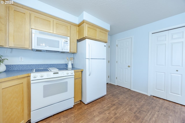 3618 Sterling Woods Dr, Eugene, OR 97408 - kitchen with white appliances, light brown cabinets, wood finished floors, and light countertops