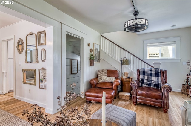 51 N Dean St, Coquille, OR 97423 - living room featuring light wood-style flooring, stairs, and baseboards