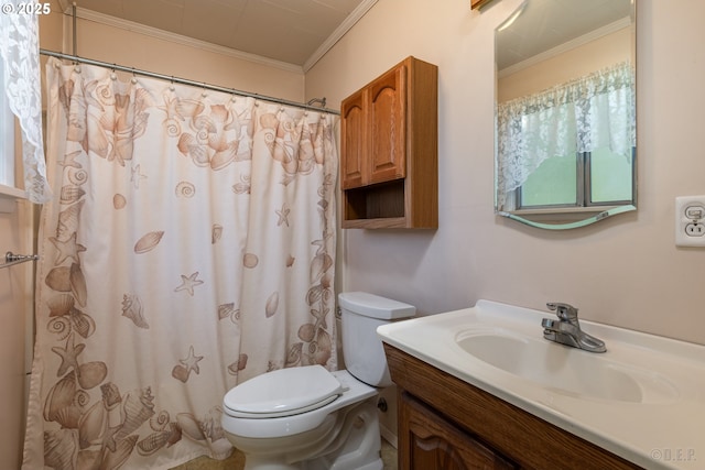 bathroom featuring crown molding, vanity, and toilet