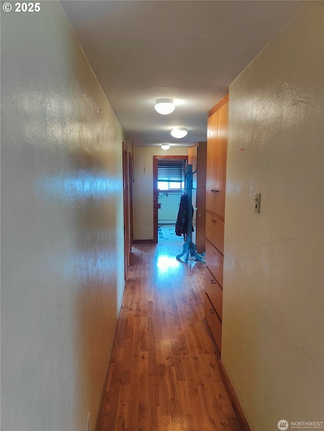 3420 Prill Rd, Centralia, WA 98531 - hall featuring light wood-type flooring and baseboards