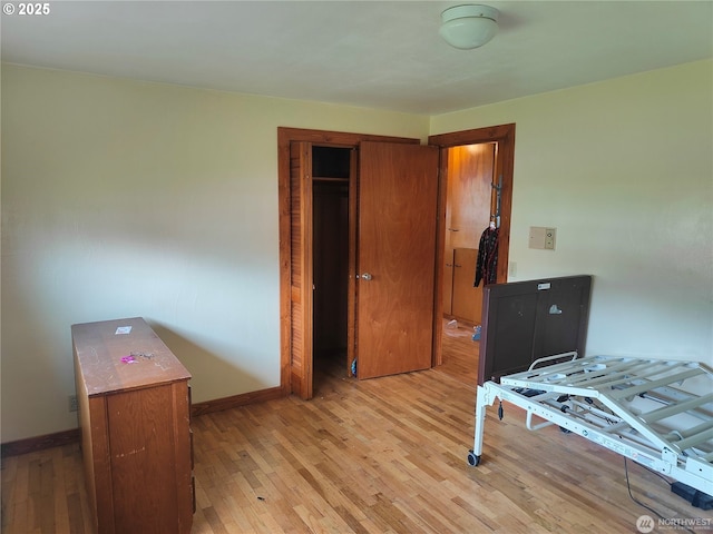 3420 Prill Rd, Centralia, WA 98531 - bedroom with light wood finished floors, baseboards, and a closet