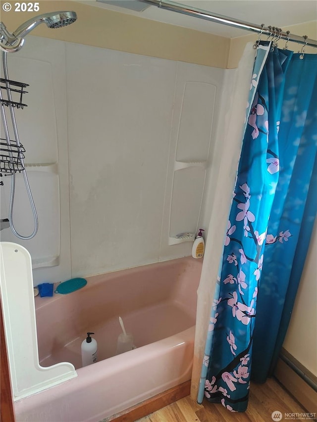 3420 Prill Rd, Centralia, WA 98531 - full bathroom featuring shower / tub combo and wood finished floors