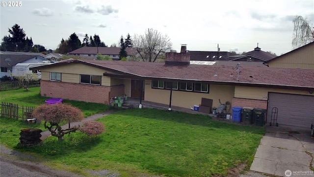 3420 Prill Rd, Centralia, WA 98531 - view of front of property featuring brick siding, concrete driveway, a chimney, and stucco siding