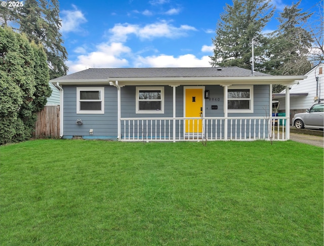 view of front of house with a porch and a front yard