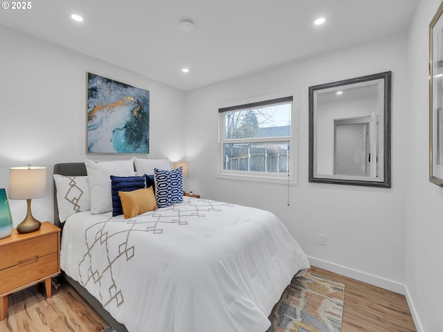 bedroom featuring hardwood / wood-style flooring