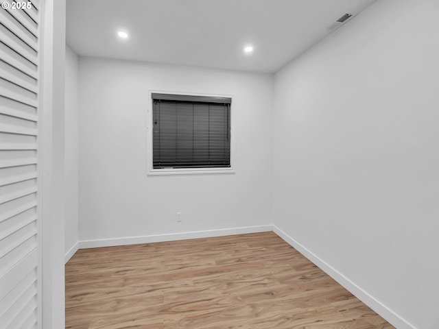 empty room featuring light hardwood / wood-style floors