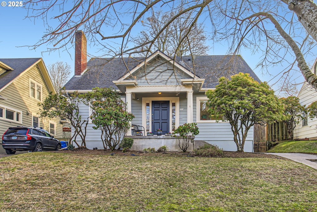 view of front of house with a front yard