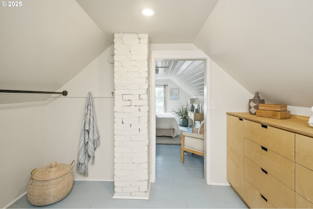 interior space featuring vaulted ceiling