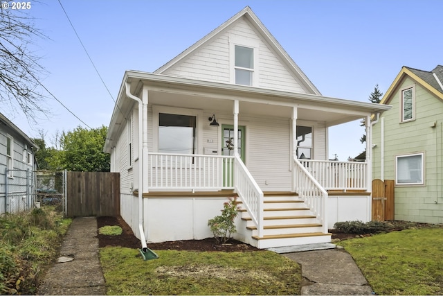 bungalow-style house featuring covered porch