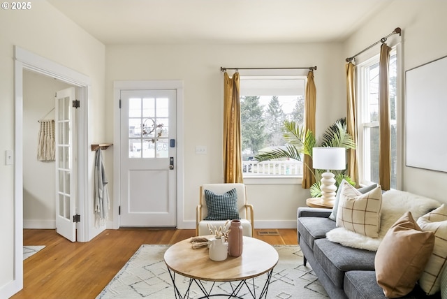 sitting room with light hardwood / wood-style flooring