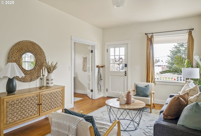 living area with light hardwood / wood-style floors