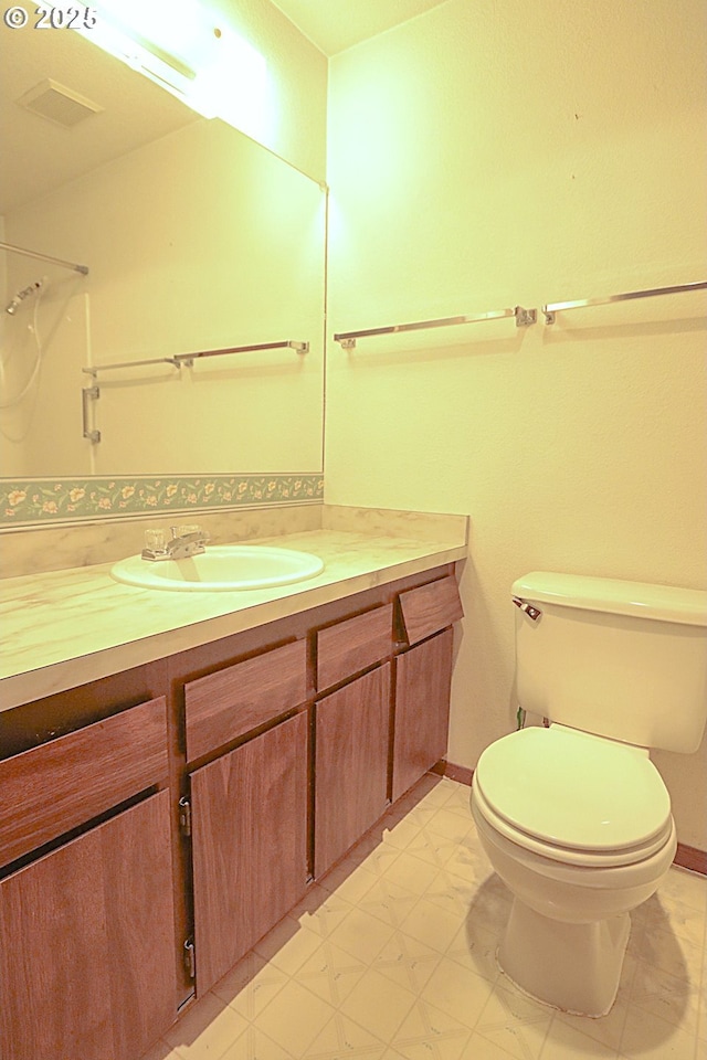 825 Seabreeze Ter, Coos Bay, OR 97420 - bathroom featuring vanity and marble look tile flooring