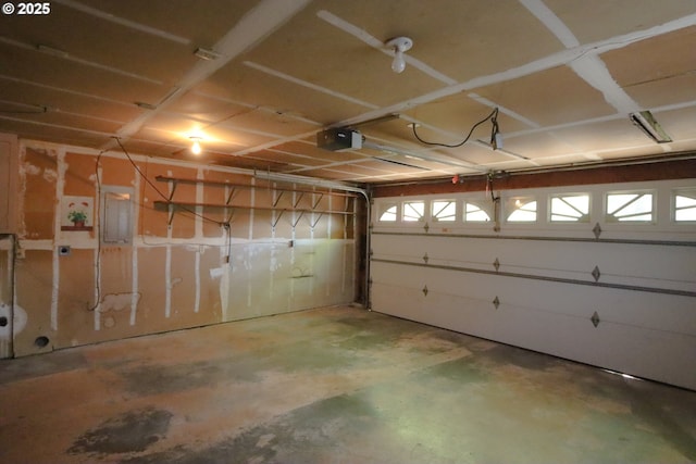 825 Seabreeze Ter, Coos Bay, OR 97420 - garage with a garage door opener and electric panel