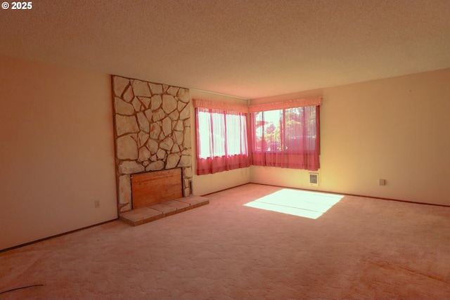 825 Seabreeze Ter, Coos Bay, OR 97420 - carpeted empty room featuring a textured ceiling and baseboards