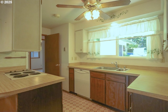 825 Seabreeze Ter, Coos Bay, OR 97420 - kitchen with white appliances, light countertops, and a ceiling fan