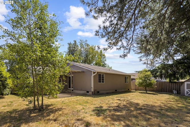 2301 SW 22nd St, Troutdale, OR 97060 - back of property with a storage shed, crawl space, and a patio