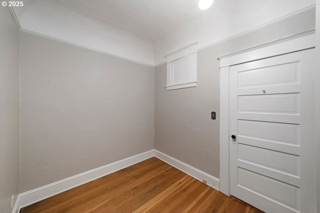 laundry area featuring hardwood / wood-style floors