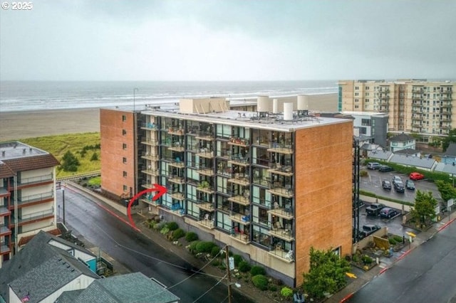 view of building exterior with a water view