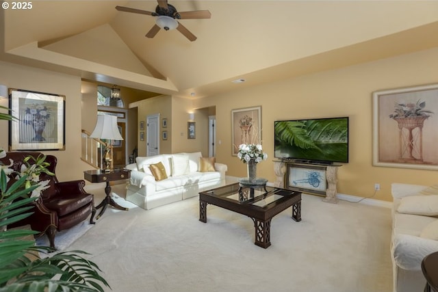 2567 SE Coriander, Grants Pass, OR 97527 - living area featuring carpet floors, ceiling fan, and vaulted ceiling