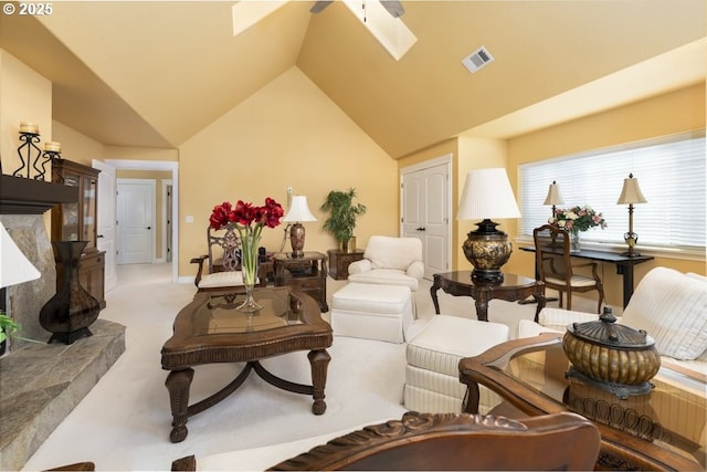2567 SE Coriander, Grants Pass, OR 97527 - carpeted living room with a skylight and vaulted ceiling