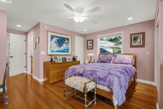10145 SW Paulina Dr, Tualatin, OR 97062 - bedroom featuring baseboards, recessed lighting, wood finished floors, and a ceiling fan