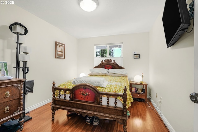 10145 SW Paulina Dr, Tualatin, OR 97062 - bedroom with wood-type flooring and baseboards