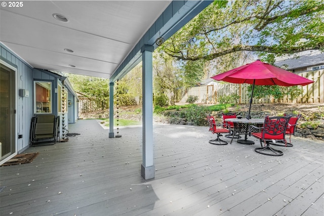 10145 SW Paulina Dr, Tualatin, OR 97062 - wooden deck featuring outdoor dining area and fence