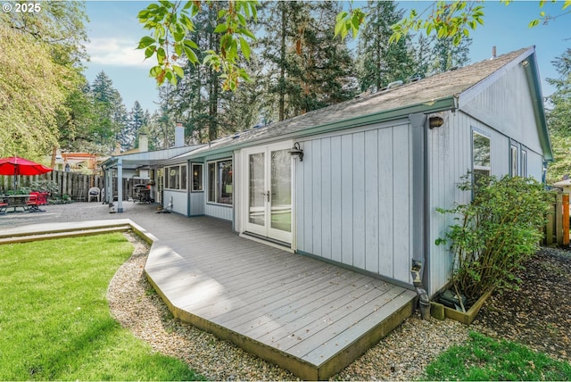 10145 SW Paulina Dr, Tualatin, OR 97062 - back of property featuring a deck, fence, and a lawn
