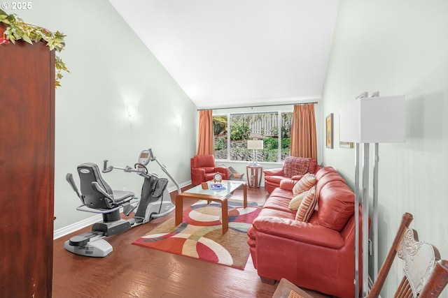10145 SW Paulina Dr, Tualatin, OR 97062 - living area featuring wood finished floors, baseboards, and lofted ceiling