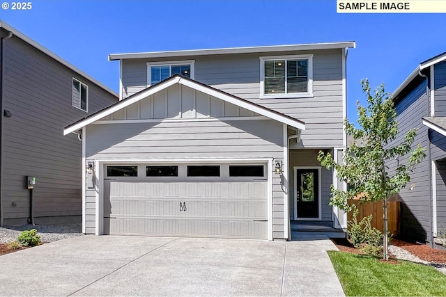 view of front of home featuring board and batten siding and concrete driveway