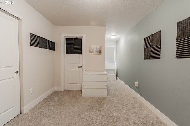 5394 SE 136th Ave, Portland, OR 97236 - hall featuring light carpet and a textured ceiling