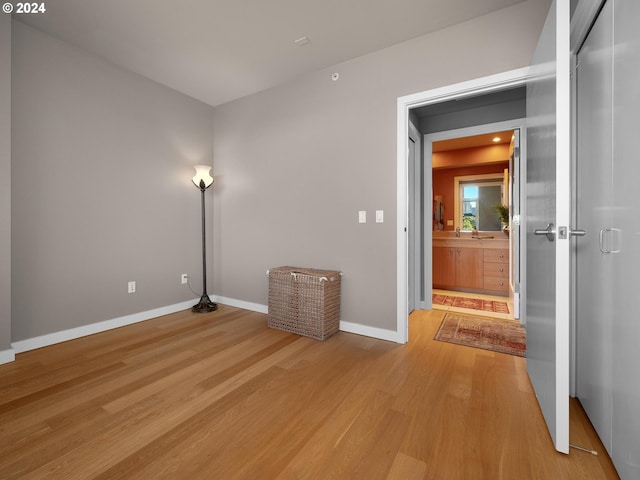 spare room with light hardwood / wood-style floors