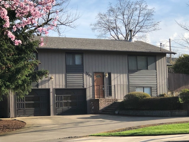 view of front facade featuring an attached garage and driveway